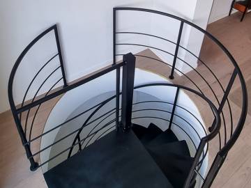 CIRCLE STEEL: Minimalistische stalen wenteltrap | SPIRA